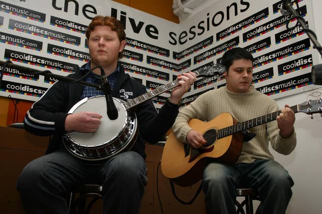 Martin McGinley and Raymond Ferguson. : Talented Derry musicians performing at Cool Discs Live Session inside the Foyle Street store back in February 2005.