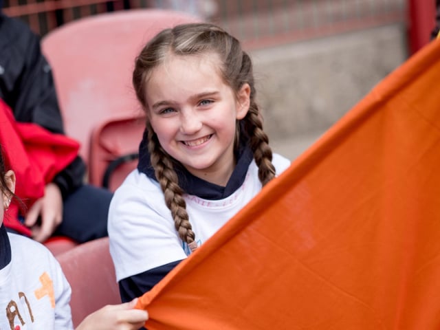 Participants at the Derry Diocese Fan The Flame annual Mass 2025 in Celtic Park.