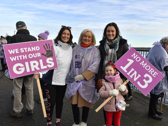 Proponents who participated in the Foyle Women’s Aid walk, from Sainsbury’s to the Guildhall on Sunday afternoon, supporting the United Nations Women’s Campaign to eliminate gender – based violence worldwide. Photo: George Sweeney