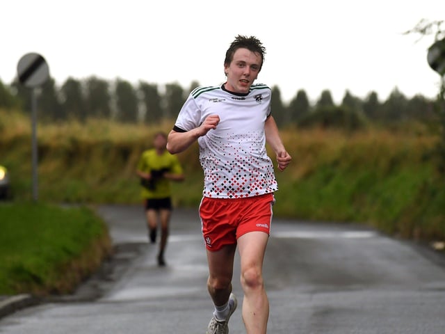 Cormac Kelly finishing the Doire Trasna 'Canter on the Corrody' 5k last week. Photo: George Sweeney