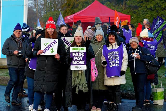 Health and care workers from NIPSA, UNISON and GMB trade unions, campaigning for fair pay and conditions, take part in industrial action at Altnagelvin Hospital on Monday morning.  Photo: George Sweeney. DER2250GS – 04