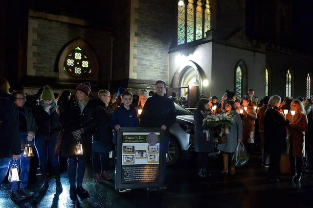 Relatives gather after mass at St Columba’s Church to take part in a wreath laying event, at Strabane Old Road, on the 50th Anniversary of the Annie’s Bar massacre on Tuesday evening. Photo: George Sweeney. DER2251GS – 11