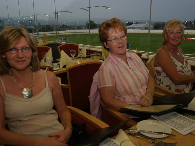 Derry and Donegal people enjoying a night at the Lifford races in June 2005.