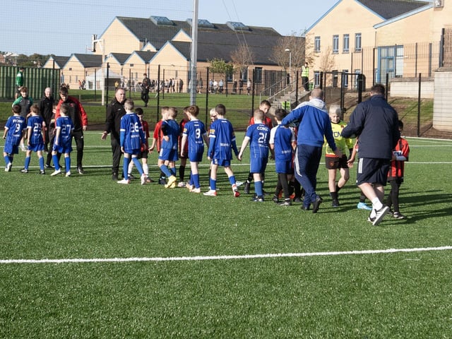 Teams line up for post game handshakes at St. Joseph's. (Photo: Jim McCafferty)