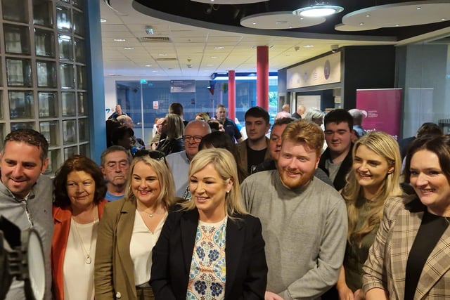 Sinn Féin First Minister designate Michelle O'Neill with some of the 18 SF candidates elected at the Count Centre at Foyle Arena on Saturday.