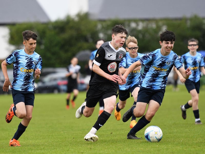 Michael McColgan powers forward for Maiden City Academy during their O'Neills Foyle Cup Under-13's final against Magherafelt Sky Blues at Wilton Park.
