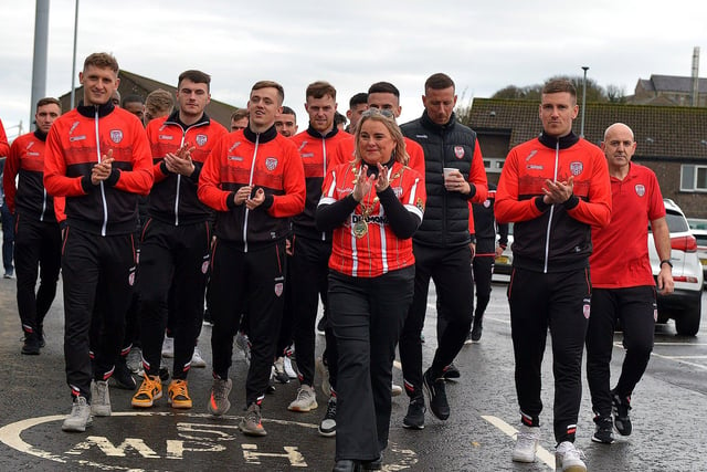 Mayor Sandra Duffy with Derry City players and staff on their way to greet fans gathered at Brandywell Stadium on Saturday morning prior to their departure for Dublin ahead of tomorrow’s FAI Cup Final against Shelbourne. George Sweeney.  DER2244GS – 43