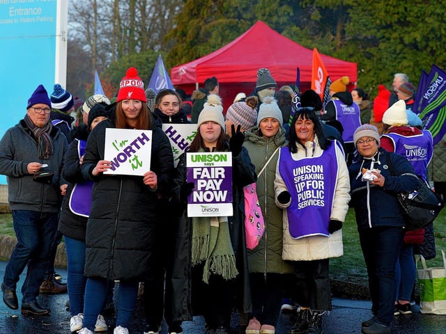 Health and care workers from NIPSA, UNISON and GMB trade unions, campaigning for fair pay and conditions, take part in industrial action at Altnagelvin Hospital on Monday morning. Photo: George Sweeney. DER2250GS – 04