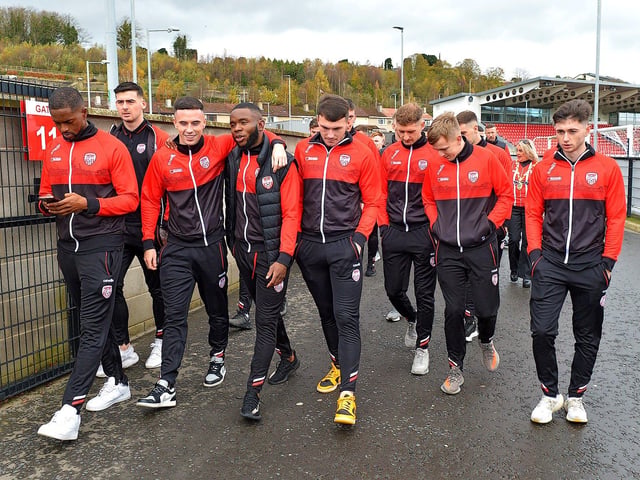 Derry City players and staff on their way to greet fans gathered at Brandywell Stadium on Saturday morning prior to their departure for Dublin ahead of tomorrow’s FAI Cup Final against Shelbourne. George Sweeney.  DER2244GS – 38