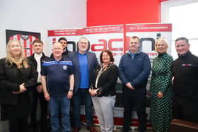 Director Tommy Fitzsimmons and the Mayor of Derry & Strabane Patricia Logue, staff, Robert from Derry City, Raymond from Trojan's FC, and Anna Doherty from Derry Chamber of Commerce.