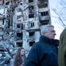 Filippo Grandi, the United Nations High Commissioner for Refugees, tours a neighborhood in Kharkiv that was heavily damaged by the Russians on January 24, 2023. (Photo by Spencer Platt/Getty Images)