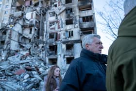 Filippo Grandi, the United Nations High Commissioner for Refugees, tours a neighborhood in Kharkiv that was heavily damaged by the Russians on January 24, 2023. (Photo by Spencer Platt/Getty Images)