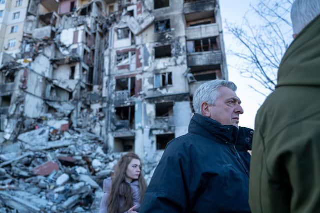 Filippo Grandi, the United Nations High Commissioner for Refugees, tours a neighborhood in Kharkiv that was heavily damaged by the Russians on January 24, 2023. (Photo by Spencer Platt/Getty Images)
