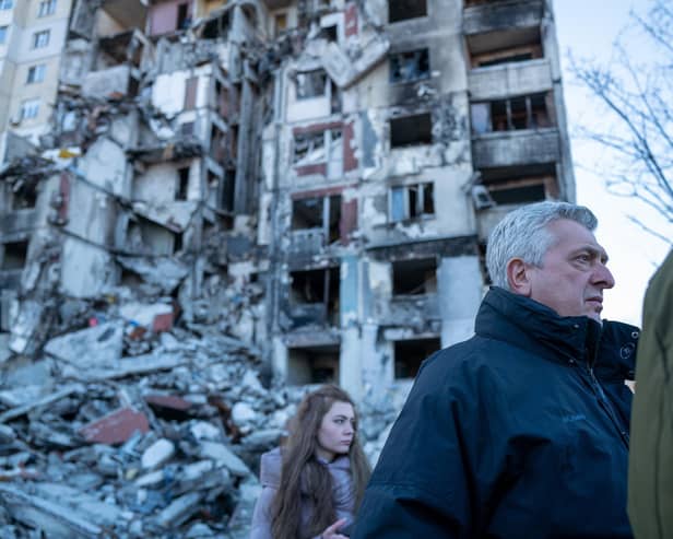 Filippo Grandi, the United Nations High Commissioner for Refugees, tours a neighborhood in Kharkiv that was heavily damaged by the Russians on January 24, 2023. (Photo by Spencer Platt/Getty Images)