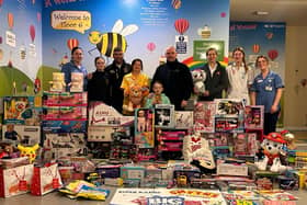 River Radios Director Gerard Doherty and his 7-year-old daughter Yazmin Doherty (Toy Appeal founder) are pictured centre with Cathy Grady, Play Specialist Children's Ward, accompanied by Charity Partner The Salvation Army’s Captain Sharron and Keith Gamble and his daughter Ellie from The Bear Run 74 Charity and their team bringing toys to the Children’s Ward at Altnagelvin Hospital.