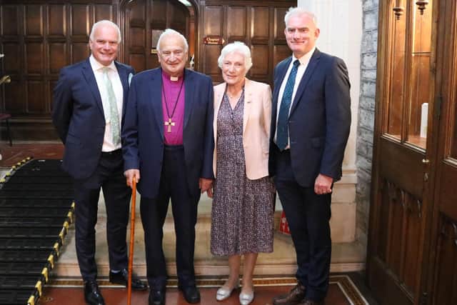 Lord Eames with Lady Eames and sons Niall and Michael - left and right respectively