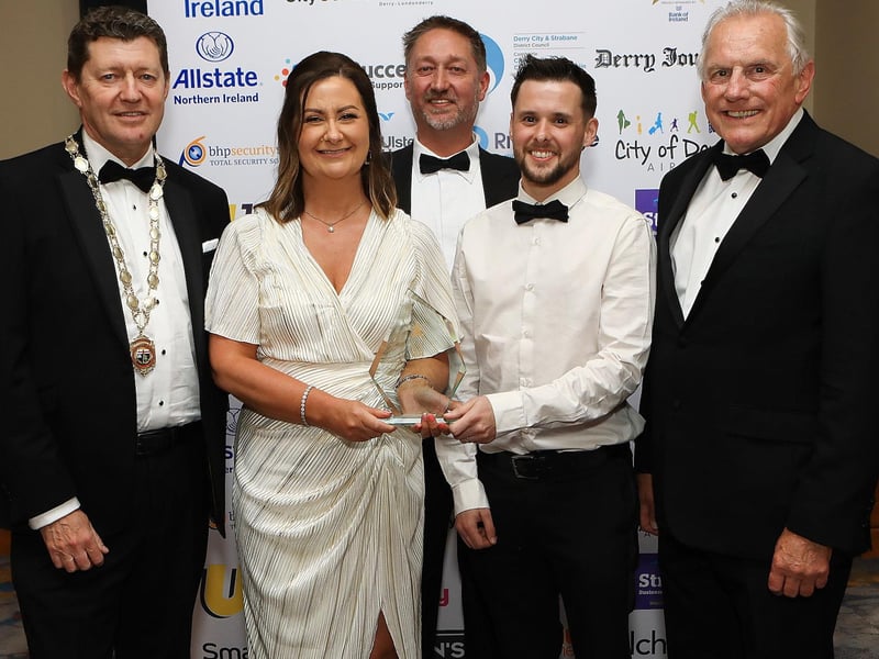 Greg McCann, President of Londonderry Chamber of Commerce, Steve Frazer, MD of City of Derry Airport, and Ian Crowe, Secretary of CCI presenting Waterside Credit Union with the Contribution to The North West Economy Award.