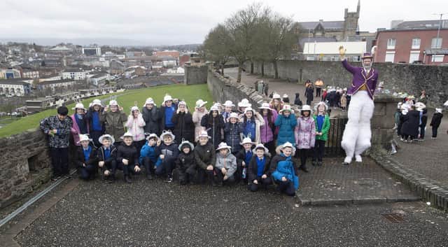Pupils from Nazareth House PS pictured before taking part in Feile Derry's Easter Bonnet Parade on Tuesday.