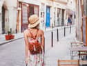 Seeing the sights on foot can help to cut your carbon footprint when travelling (photo: Adobe)