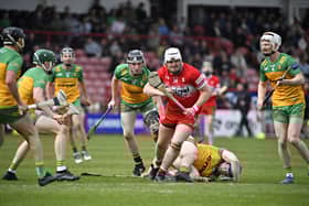 Derry’s Christy McNaughton charges through the Donegal defence. Photo: George Sweeney