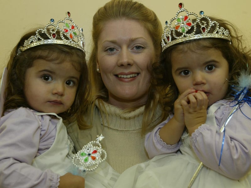 Zara and Emine Oymak with mum Stephanie. (0311JB71):20 YEARS ON: Halloween celebrations in Derry in 2003
