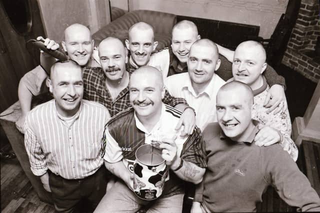 The Venue/ Rafters bouncers shave their heads back in January 1996.