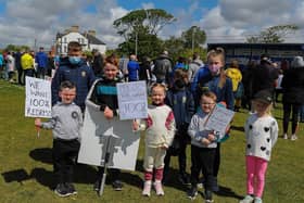 Young demonstrators at a previous rally over the Defective Blocks crisis rally at Buncrana’s Shorefront. Photo: George Sweeney. DER2120GS – 040