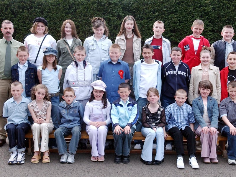 Pupils from St Paul's Primary School, Slievemore, who were confirmed in St. Joseph's Church, Galliagh, by Most Rev. Dr. Seamus Hegarty, Bishop of Derry. Included is Mr Damien Barr, Class teacher.