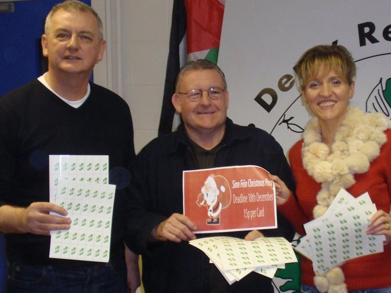 Sinn Féin councillors Paul Fleming and Tony Hassan pictured launching the party's annual Christmans post with Foyle MLA Martina Anderson. (0212MM06)