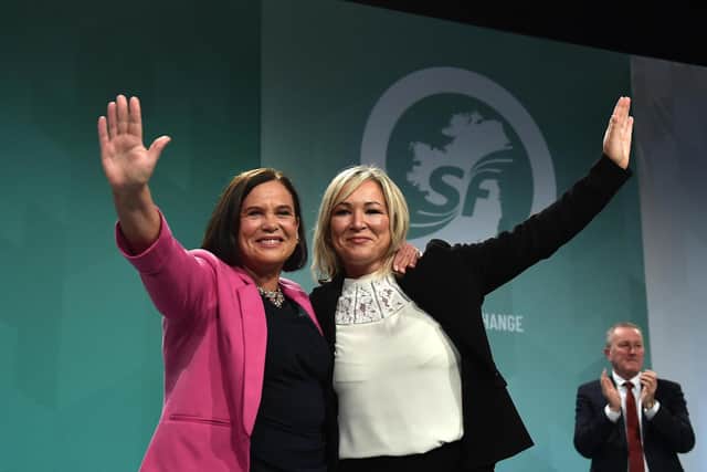 Sinn Fein president Mary Lou McDonald and vice-president Michelle O'Neill wave to the conference during the Sinn Fein Ard Fheis on November 11, 2023 in Athlone, Ireland. (Photo by Charles McQuillan/Getty Images)