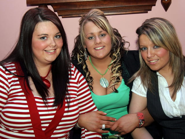 Sarah poses for the photographer with party guests, Cathy and Nyeasla and Tina 0040JML : Parties and nights out in Derry and Donegal in February 2006.