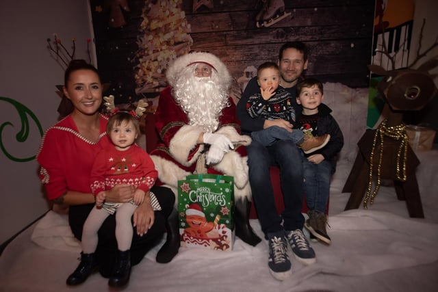 Jonah Craig and family meeting Santa Claus.