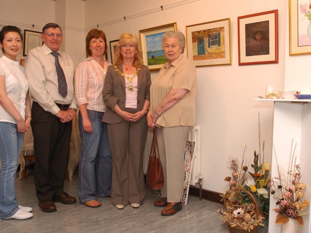 Then Mayor of Derry Councillor Helen Quigley officially opens the end of term art exhibition at Eden Place Arts Centre with, from left, Rebecca McClenaghan, Gus Hastings, Pilots Row manager, Helen Shiels, and Ethna Shiels. (0707PG20)