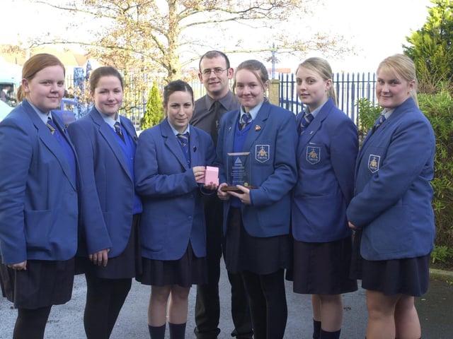 Pupils from St Mary's College with their Young Enterprise Award for best product, a mobile phone charger tidy. Included s technology teacher Gavin Molley.