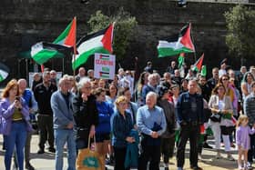 People gather at a rally in Guildhall Square, organised by the Derry Branch of Ireland Palestine Solidarity Campaign to mark 300 days of Genocide in Gaza. Photo: George Sweeney
