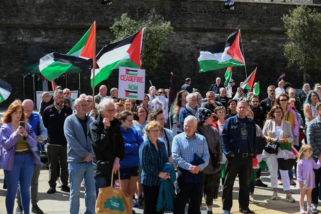 People gather at a rally in Guildhall Square, organised by the Derry Branch of Ireland Palestine Solidarity Campaign to mark 300 days of Genocide in Gaza. Photo: George Sweeney