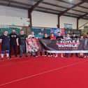 Members from Tuned In Project Derry and wrestlers from Complete Anarchy Wrestling (CAW) who will take part in Saturday's Foyle Rumble event at the City Hotel.