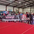 Members from Tuned In Project Derry and wrestlers from Complete Anarchy Wrestling (CAW) who will take part in Saturday's Foyle Rumble event at the City Hotel.