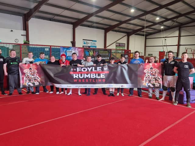 Members from Tuned In Project Derry and wrestlers from Complete Anarchy Wrestling (CAW) who will take part in Saturday's Foyle Rumble event at the City Hotel.