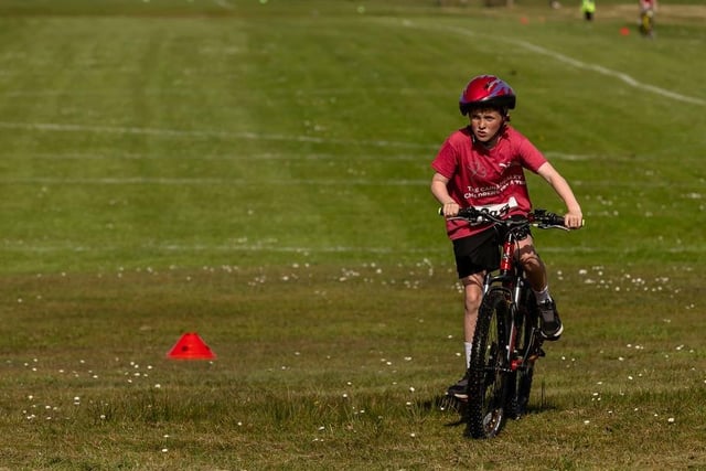 A young athlete on the cycling leg of the Caina Healey Children's Try-a-Tri event at Templemore Sports Complex. (Photo: Michelle Campbell)