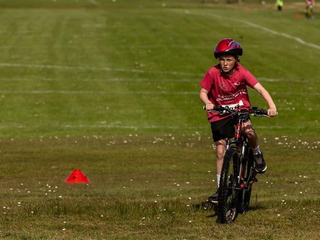 A young athlete on the cycling leg of the Caina Healey Children's Try-a-Tri event at Templemore Sports Complex. (Photo: Michelle Campbell)