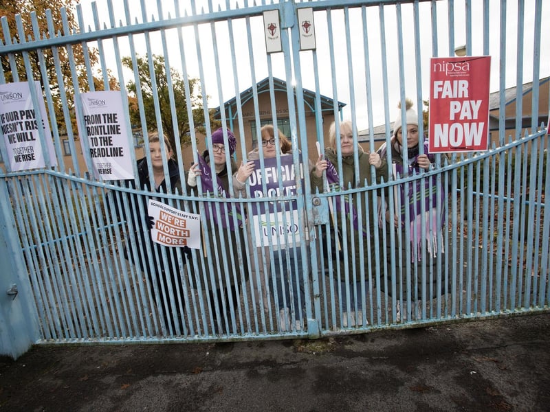 GATES CLOSED!. . . Office staff at St. Joseph's Boys School pictured on the picket line yesterday morning.
