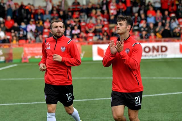 Derry City’s Paul McMullan and Danny Mullen (right) finish their warm up at the Brandywell. Photo: George Sweeney. DER2330GS -