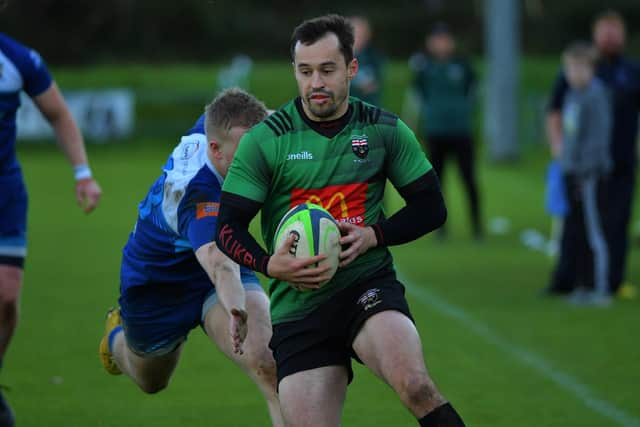 City of Derry’s Simon Logue powers towards the line to score a first half try against Portadown. Photo: George Sweeney