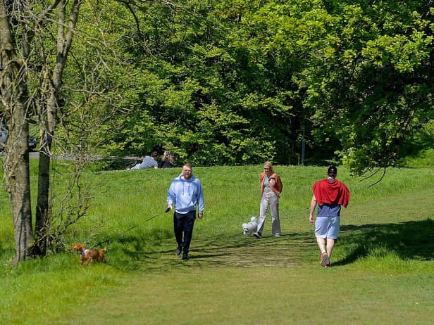 Locals enjoy a stroll in a picturesque St Columb’s Park. DER2120GS – 010