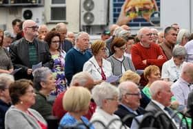 People gather for a service in Claudy marking the 52nd anniversary of the car bombings that killed nine people and injured 30 others. Photo: George Sweeney