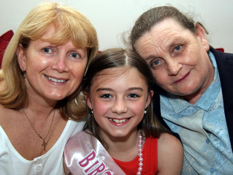 Kelsey smiles for the camera with her granny Doherty and granny O'Kane 0510JML : Parties and celebrations June 2006: Kelsea Doherty.