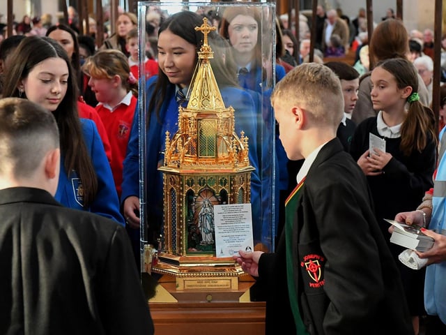 Pupils from the Derry Diocese queue for the veneration of the relics of St Bernadette at St Eugene’s Cathedral on Monday morning. Relics of the saint are being taken on pilgrimage to each of the 26 Catholic dioceses in Ireland. Photo: George Sweeney