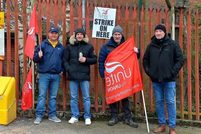 Striking Roads Services workers picket the Depart for Infrastructure Woodburn Roads depot on Crescent Road on Wednesday morning. Photo: George Sweeney. DER2310GS – 17