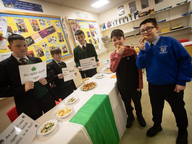 Tasting some of the savoury snacks during a visit to the Spanish Department at St. Joseph's Boys School are Conor Creagh, Long Tower and Darragh Hutton, Nazareth House PS.